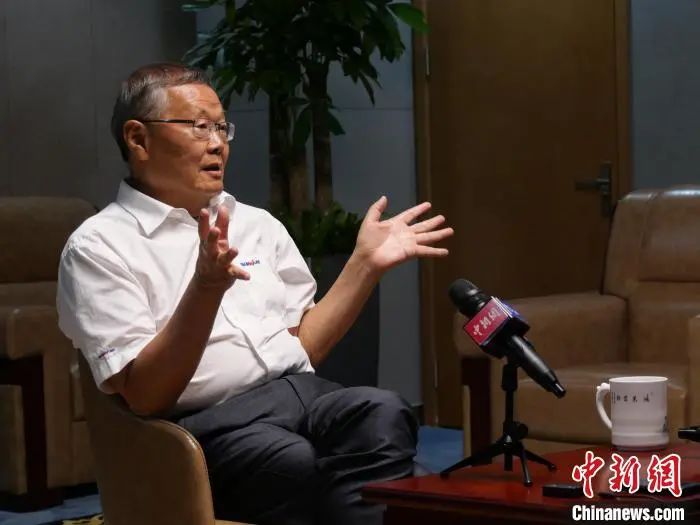媒体聚焦 | 中新社专访——优德88智能首创人何清华：向着太阳奔驰的筑梦人